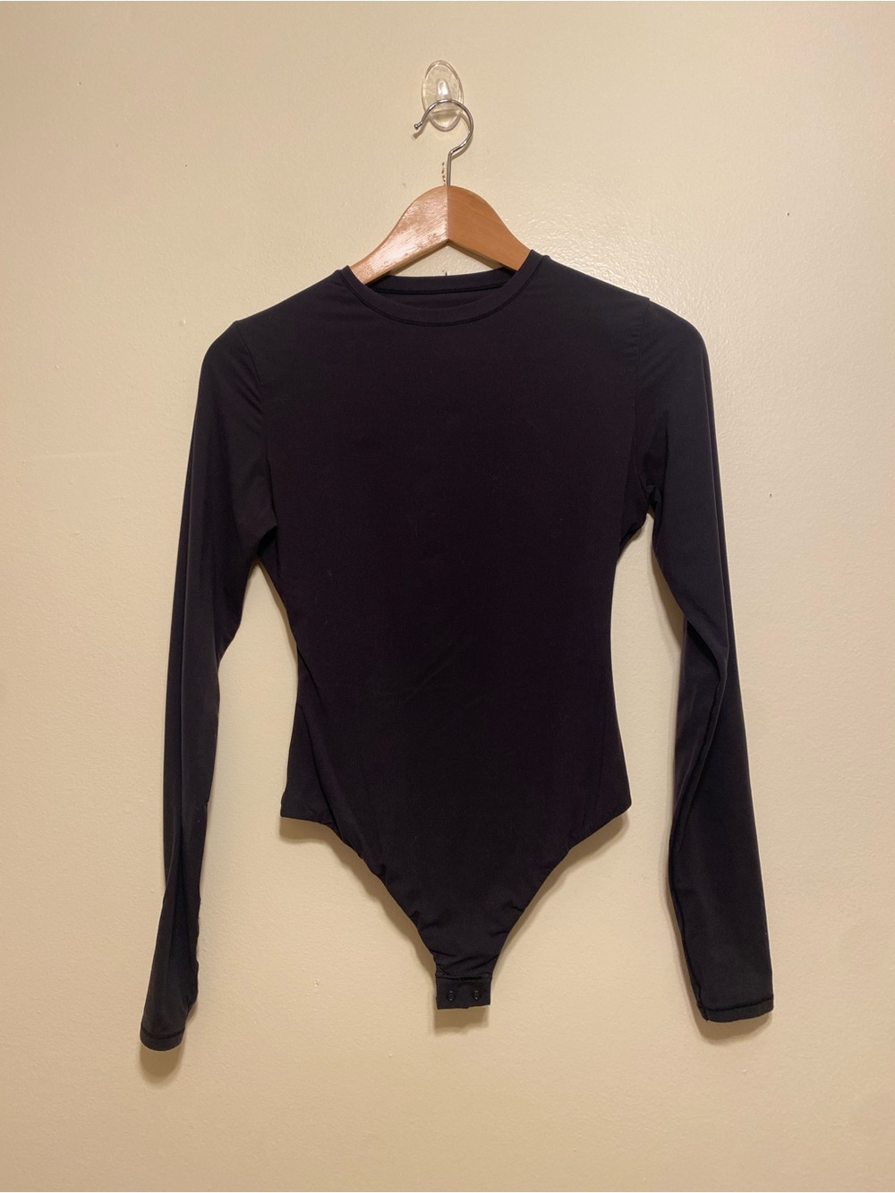 SKIMS Black Long-Sleeve Crew Neck Bodysuit. Size M